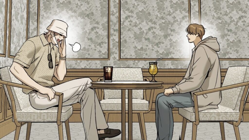 Two male characters sitting across from each other at a table